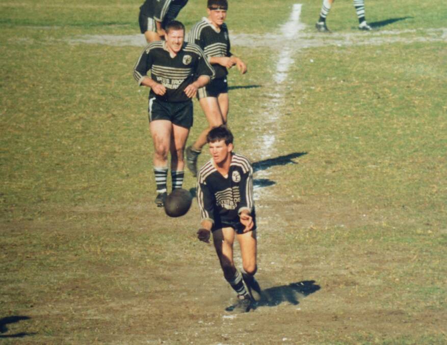 Flashback: Ken White in his Gloucester Magpies days sends out a pass in the 1989 grand final. Photo: supplied.