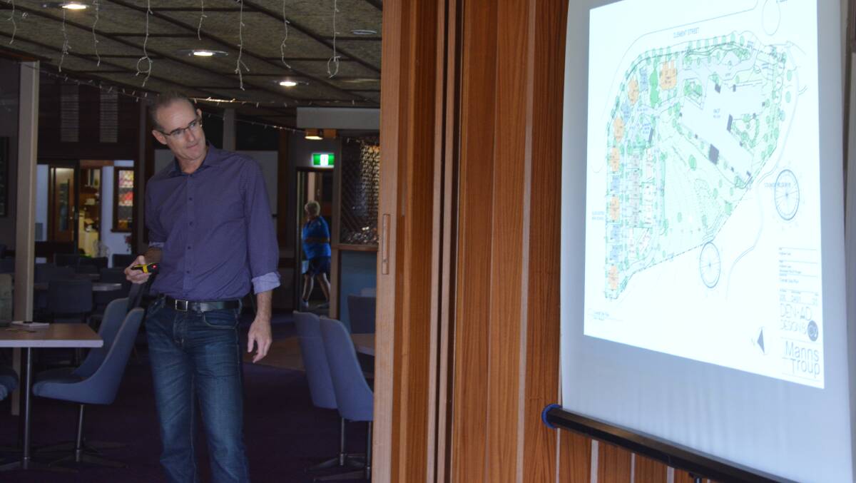 Geoff Troup from Manns and Troup outlines the design of the project at a community meeting in February 2019. Photo Anne Keen