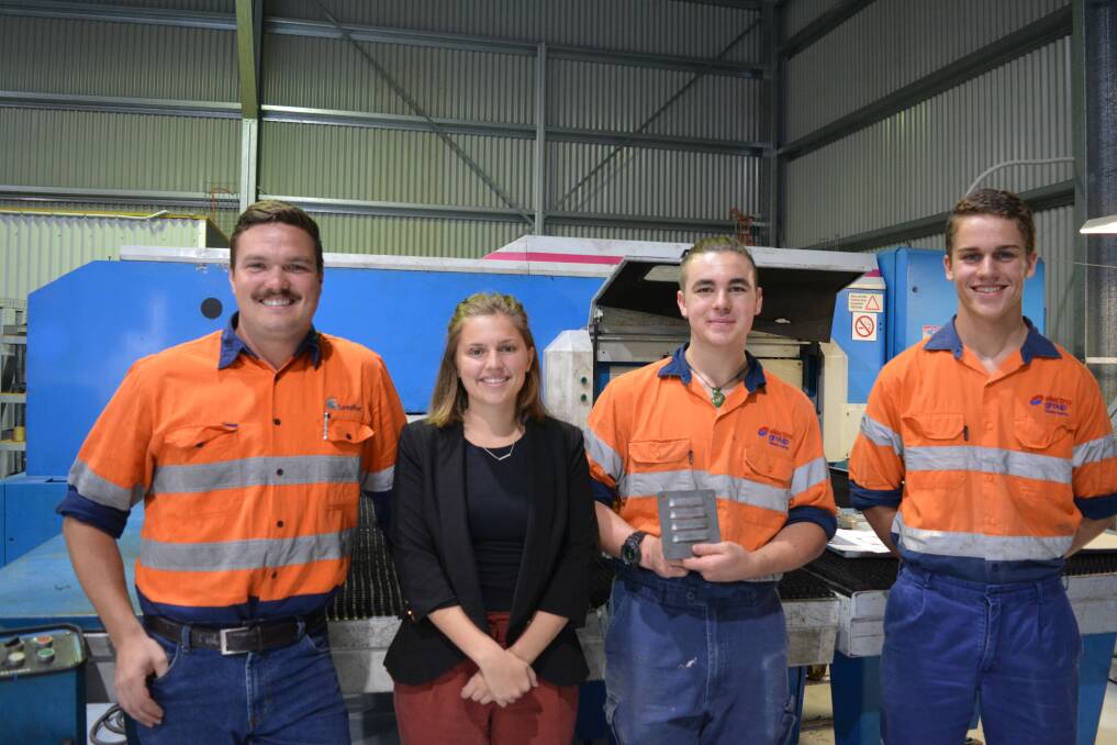 Ben Stokes, Maddy Andrews, Codie O'Brien and Josh Walker with the new-used Finn-Power Punch machines that punches and forms metal. Photo Anne Keen