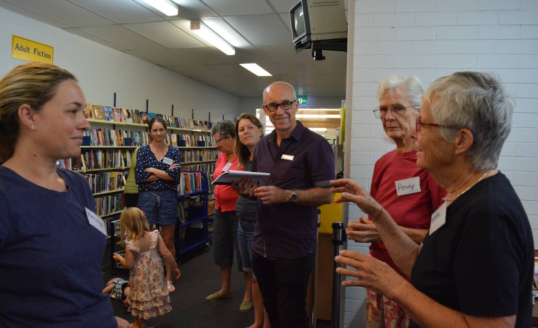 Future plan: Avid library users and members of the Gloucester community have a chat with Chris Jones about the best layout options. Photo: Anne Keen