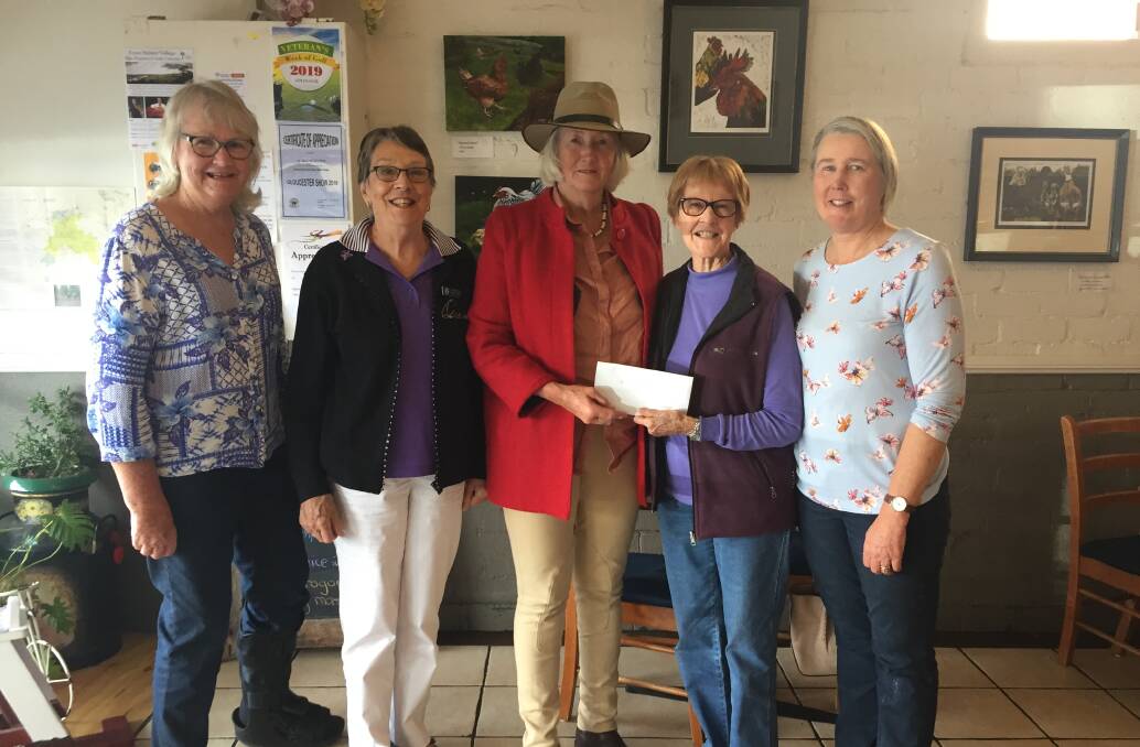 Judy Farley, Ronda Teece, Suzanne Landers, Claire Reynolds and Melinda Higgins together for the cheque presentation. Photo supplied