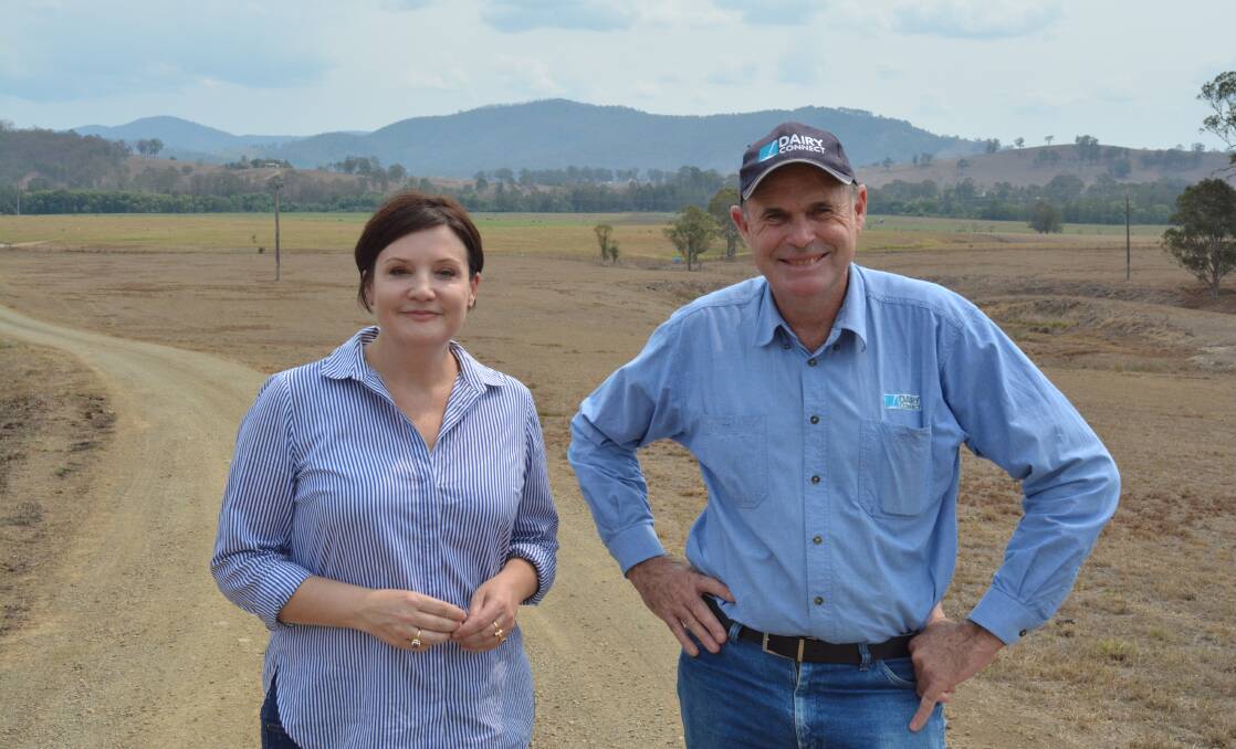 Jodi McKay and Graham Forbes overlooking part of the Forbes dairy in Gloucester. Photo Anne Keen