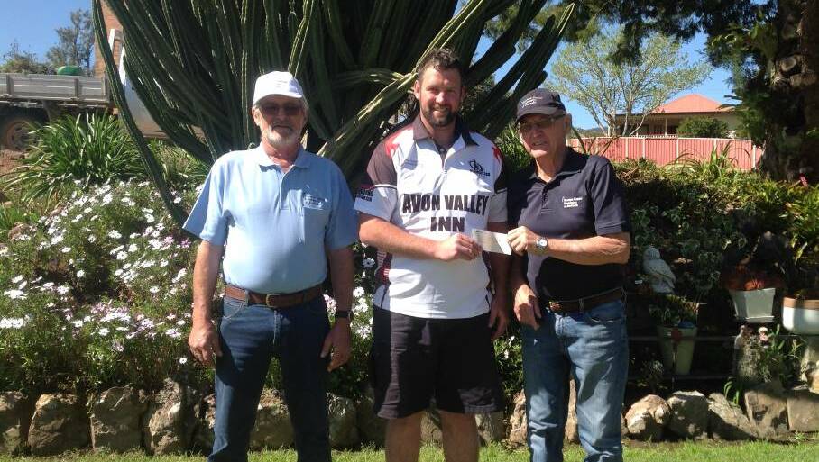 Gloucester Prostate Support Group Donation: Mathew Higgins from the Gloucester Magpies presenting a cheque for $1200 to Jim Fraser and Steve Pennicuik in September 2017.