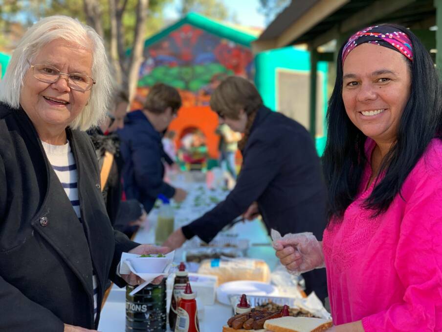 Aunty Sue Syron and Juanita McCarthy enjoy the celebrations during the fun family day out for NAIDOC at Gloucester's Billabong Park. Photo Hannah Earley