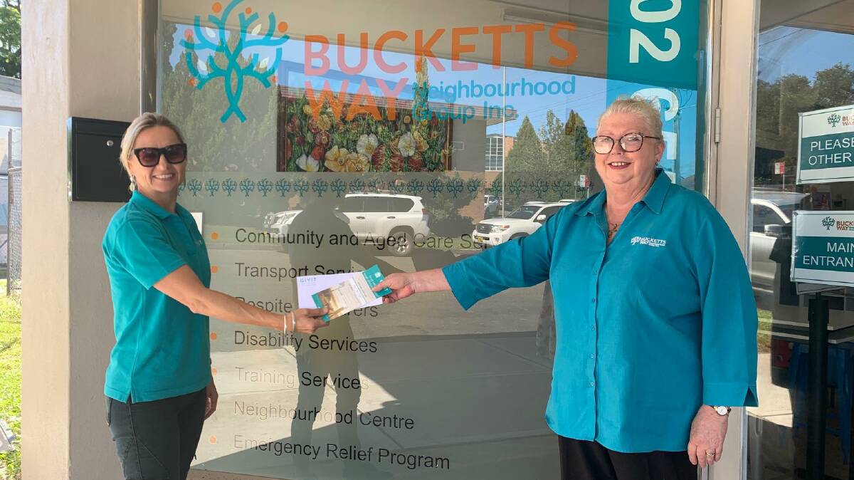 Melissa Bowman gets Kim Wiesner at Bucketts Way Neighourhood Group signed up. Photo supplied