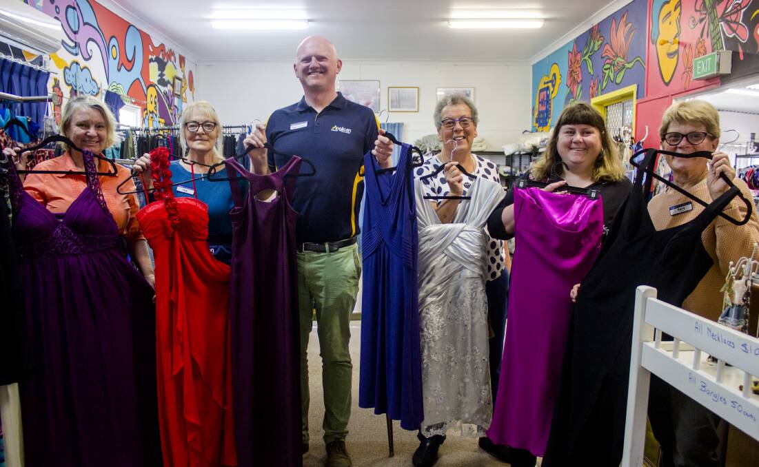 Alexis Stewart, Vikki Forbes, Rob Llewellyn, Christine Bowen-Thomas, Jess Collins and Kerry Sansom with a few of the dresses. Photo supplied