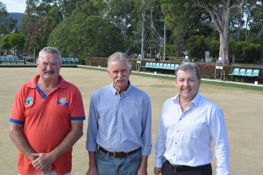 Alex Cudbertson, Mike Sheely and Ray Fitzgerald stand proudly on the newly refurbished natural bowling green. Photo Anne Keen