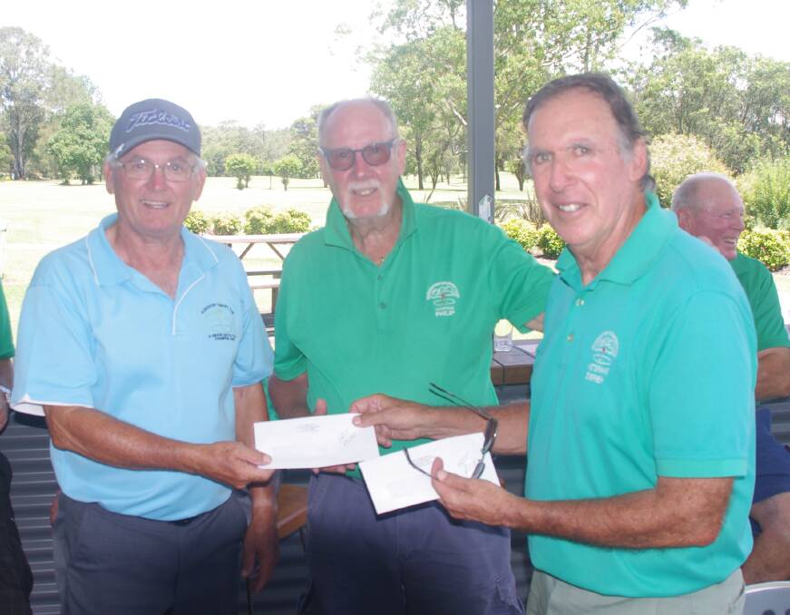 Gloucester Veterans Golf Club winners Barney McInnes and Phil Patterson receiving their winners trophies from captain Derek Bardwell. Photo supplied