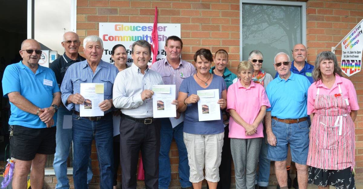 Committee members from the Gloucester Community Shop present cheques to community groups and individuals. Photo Sharla Gammage