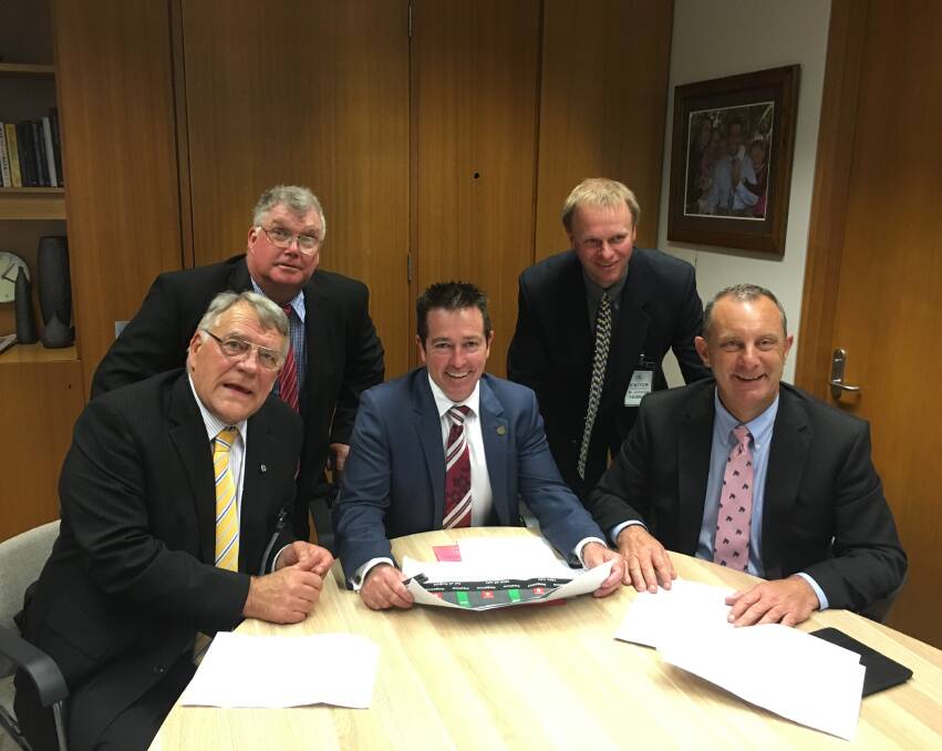 Getting stakeholders to the table: Ian Shaw, Bill Williams, Paul Toole MP, Rod Williams and Michael Johnsen MP discussing the Bucketts Way upgrade.