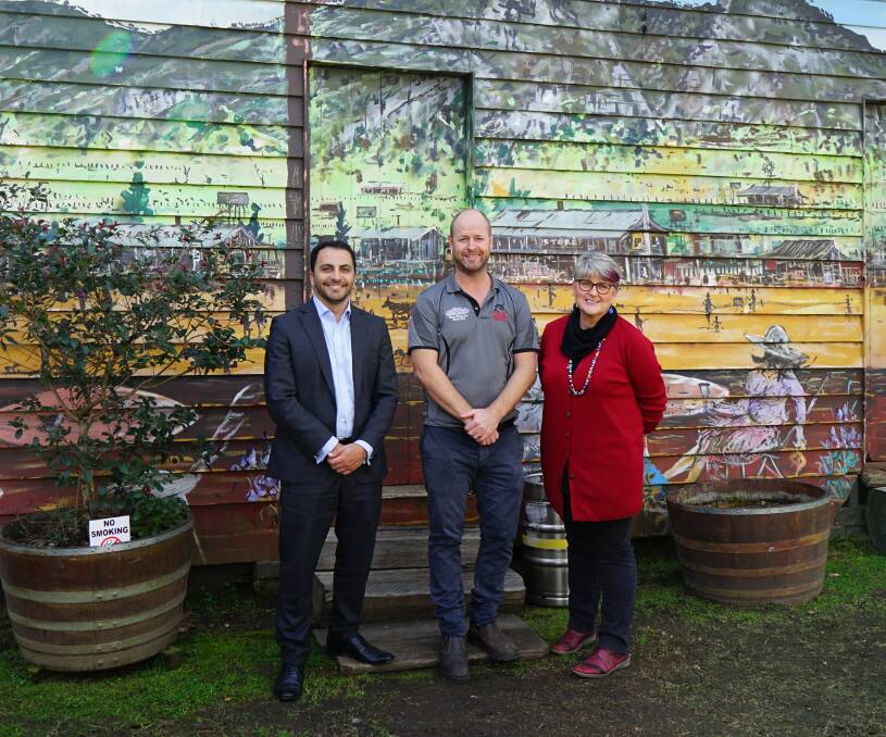 Success: Amer Hussein from AGL with Ian Negline from Avon Valley Inn and Tanya Cameron Chair of the Gloucester Independent Community Legacy Fund. Photo: Supplied