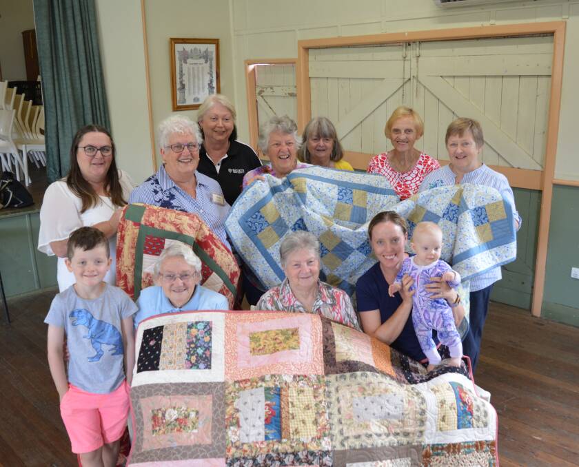 Gloucester Patchwork Group member with Kim Wiesner from Bucketts Way Neighbourhood Group at Barrington Hall. Photo Anne Keen