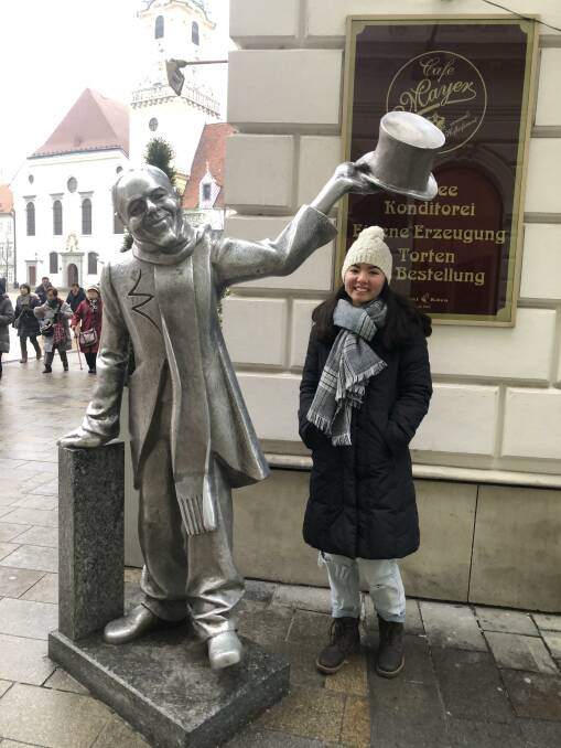 Riko Fitzgerald in Staré Mesto the old town of Bratislava with a statue of Schne Nci, a renowned Bratislava character of the mid-20th century. Photo supplied