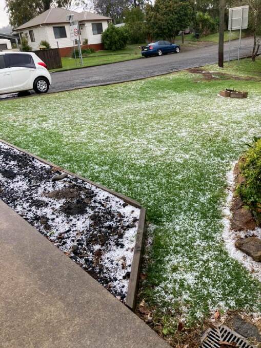 The hailstones look like snow on Lois Barkwill's lawn.