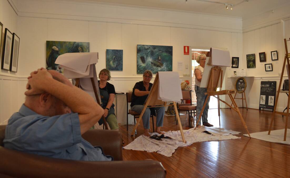 Strike a pose: Peter Moon holds his position while the class sketches him at the Gloucester Gallery. Photo: Anne Keen