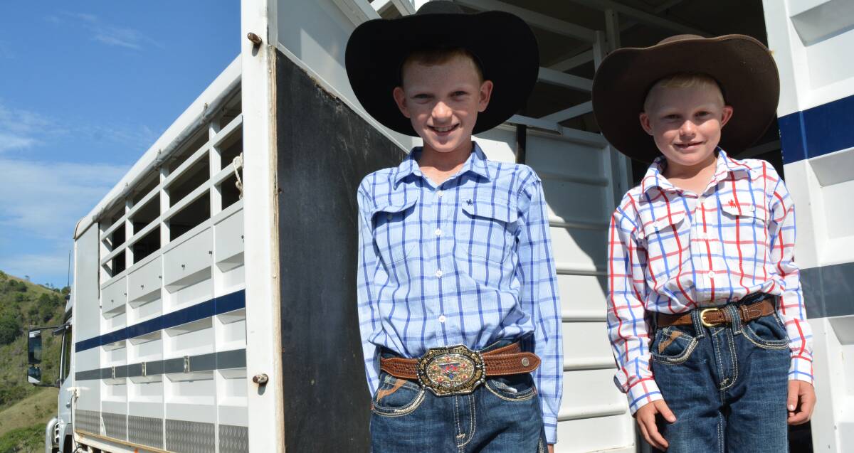 Stylish brothers: Both Travis and Lachlan Sansom enjoy hanging out in their horse truck during campdrafts wearing their best blue jeans and cowboy hats.