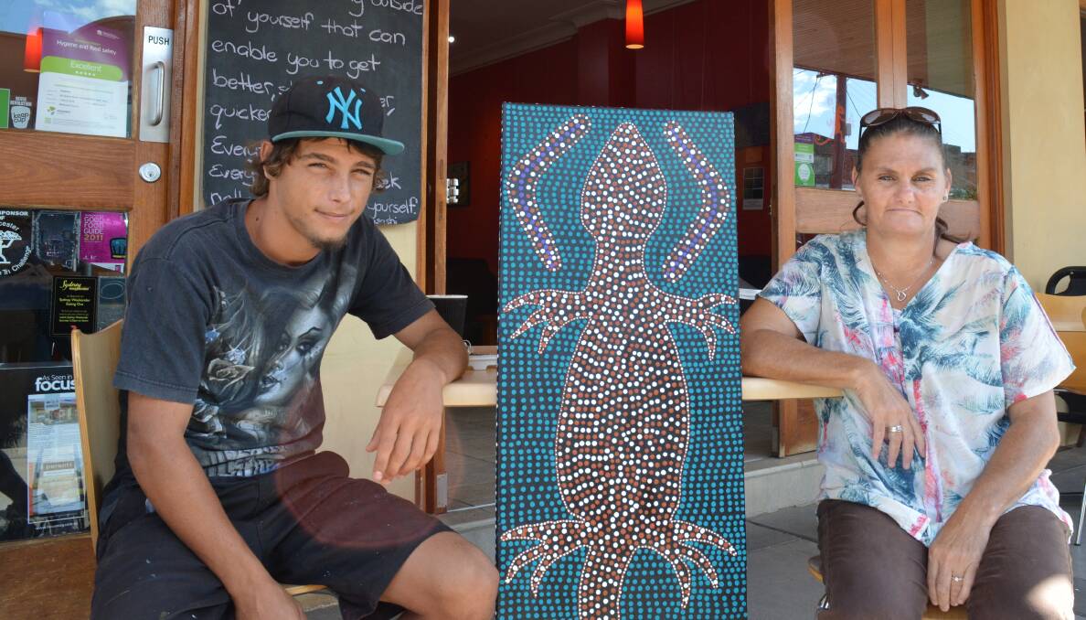 Jack Wratten and Gai Clarke had their traditional Aboriginal dot paintings on display at Gloucester's Perenti cafe in May 2018. Photo Anne Keen