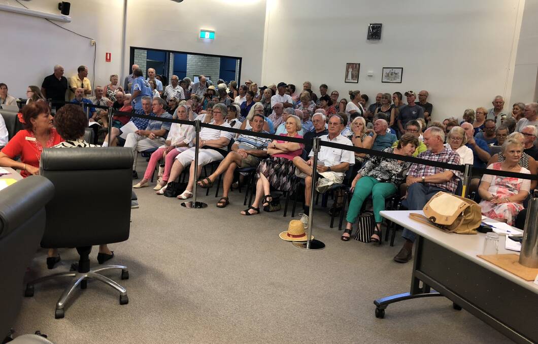 Members of the community pack the gallery at MidCoast Council's ordinary meeting at the Forster chambers on February 6.