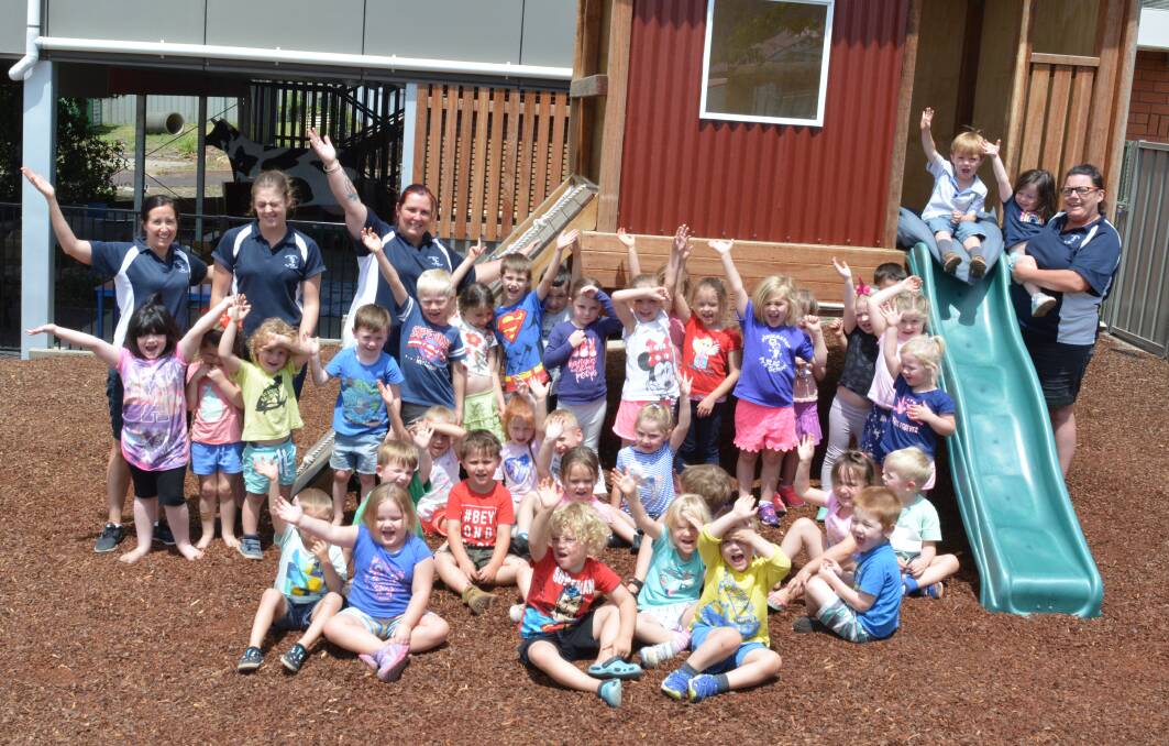 Our playground rocks: The students at Gloucester Pre-School celebrate their amazing, award winning outdoor area. Photo Anne Keen