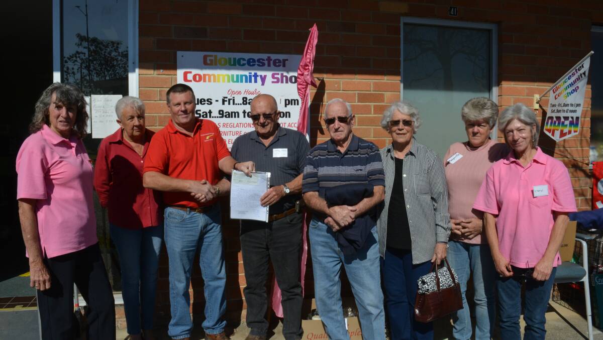 Volunteers from the Gloucester Community Shop proudly handed over the big cheque to members of the Westpac Rescue Helicopter Gloucester Support Group.