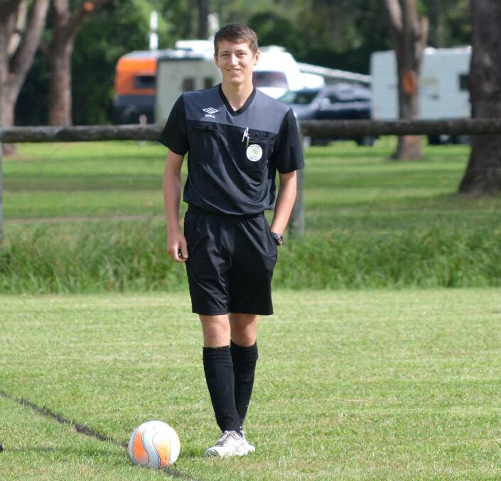 Aiden Hawkins officiating his first game as centre referee at Gloucester in the 13s match against Taree Wildcats. Photo supplied
