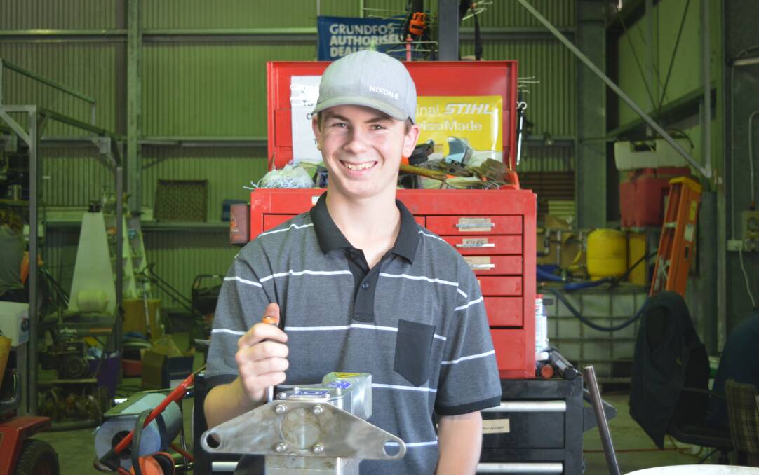 Kyle Clarke-Johnston fixing a motor at CRT for 2018 work experience. Photo Holly Willis