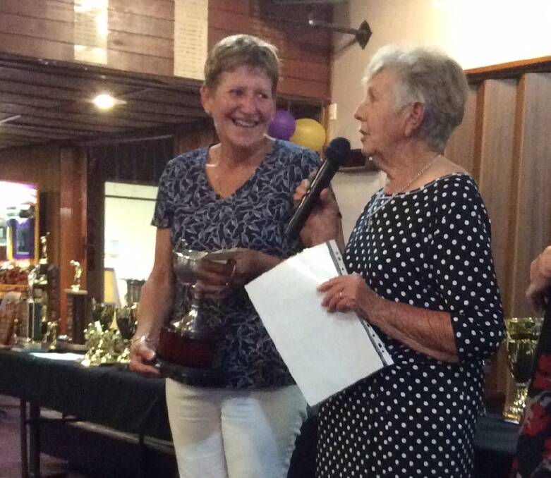 Well done: Gloucester golf club's Gai Randall is congratulated as ladies club champion by Ann Mullen. Photo supplied
