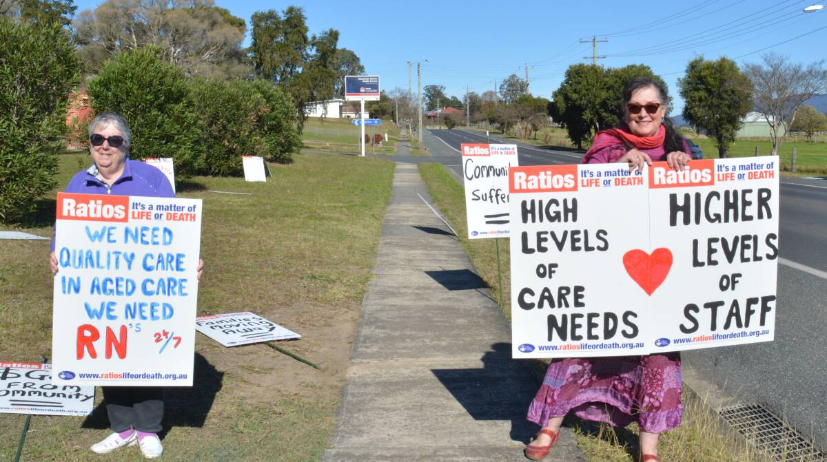 Maree Norris and Marion Rounsley stood up in protest out front of Gloucester hospital on Thursday, July 2. Photo Anne Keen