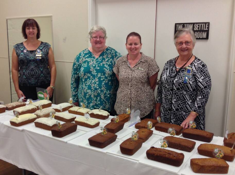 Gloucester CWA members Barbara Reichert and Erin Campbell (from the right) after judging the Hunter River Group Land Cookery Day at Morpeth. 