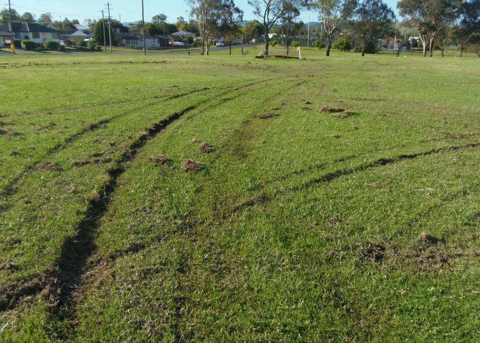 The wet grounds were so soft that the vehicle left deep ruts on the playing surface. 