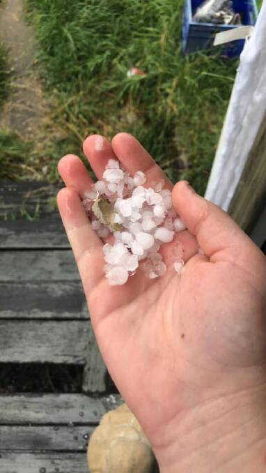 Emily Tonks gathered a handful of hail.