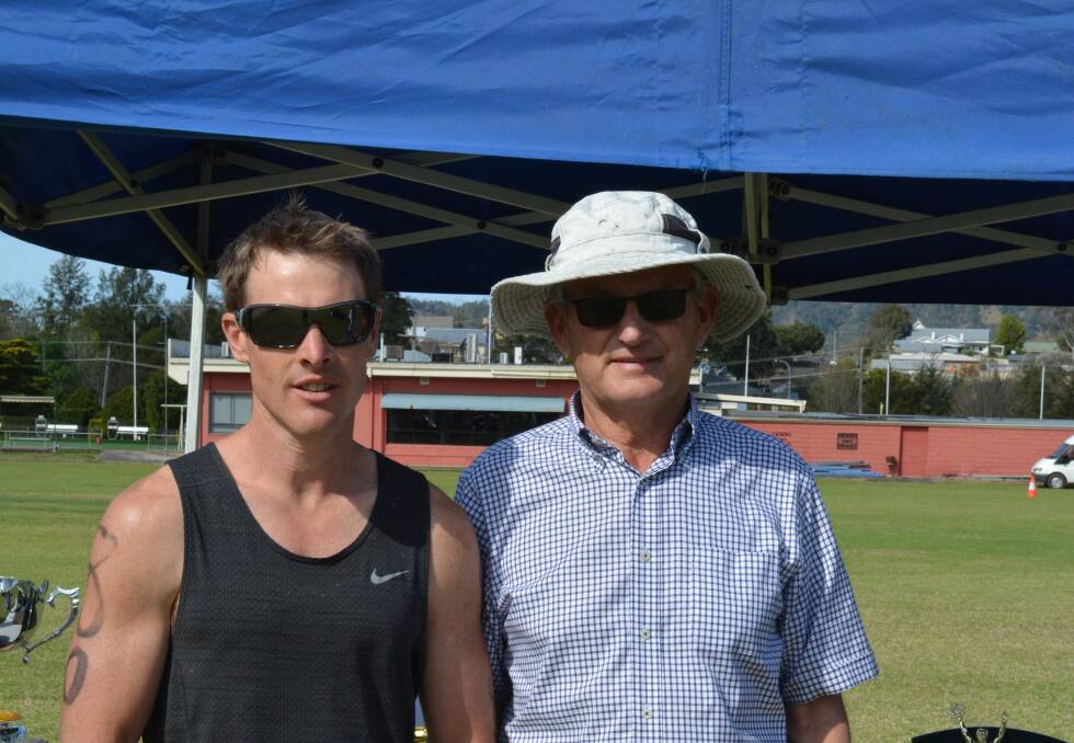 Big plans: James Saunders accepting his second place prize from event organiser Sam de Witte. Photo: Anne Keen