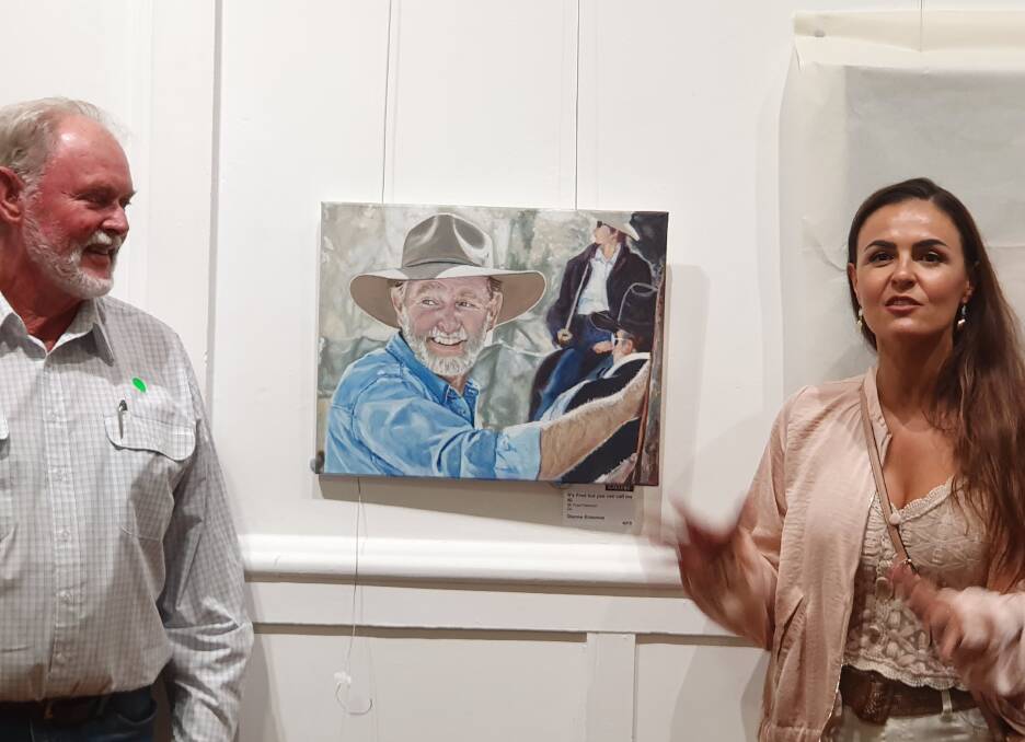 Dianne Erasmus talks about her painting of her neighbour Fred Paterson, who joined her for the event. Photo Katheryn Smith