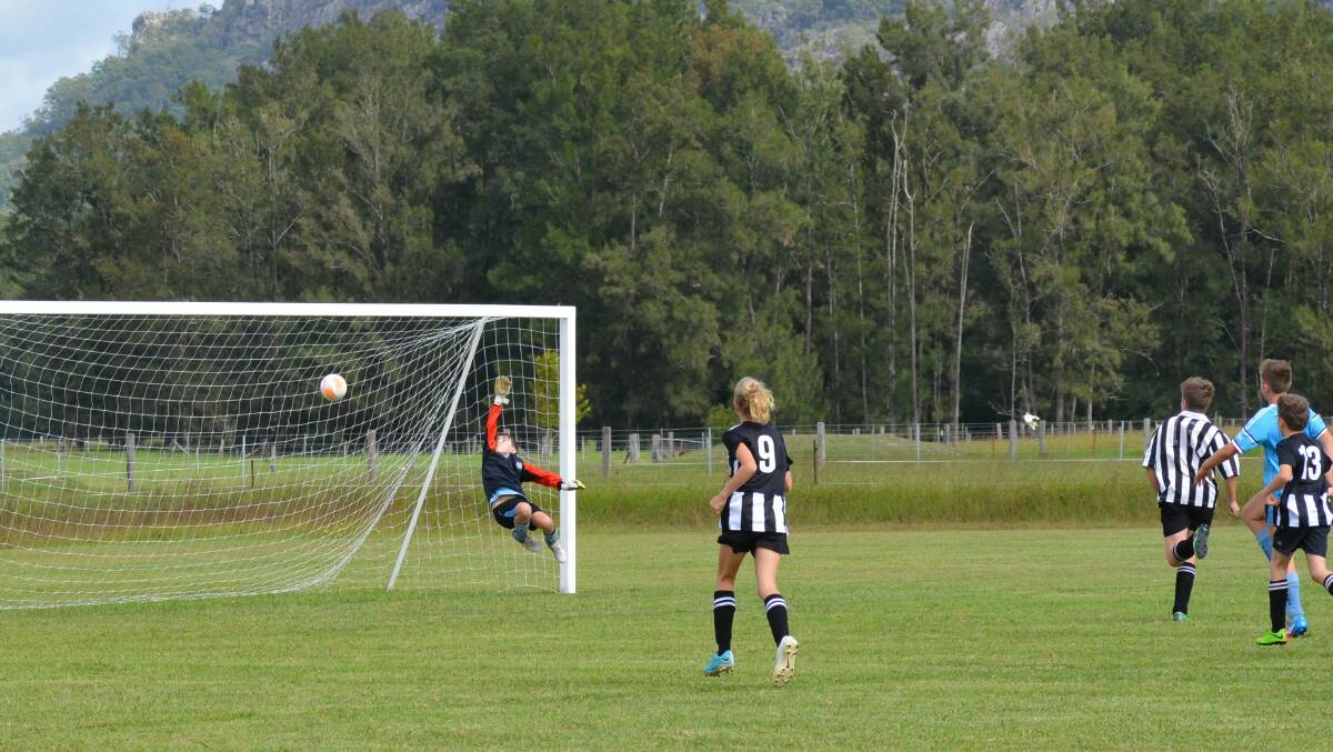 13's - Kyle Atkins scoring his goal with Rachel Smith and Harvey Willis. Photo supplied
