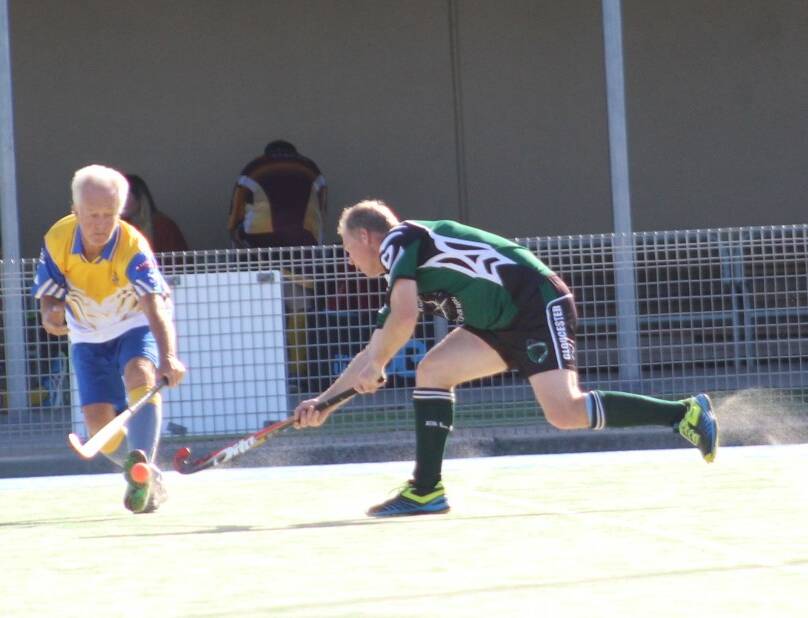 Gloucester Panther Paul Rosenbaum fights for control of the ball during the game against Taree Tigers. Photo supplied