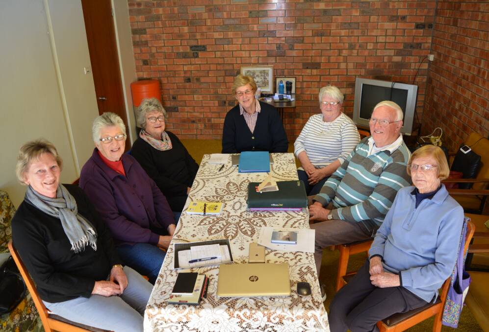 U3A members share their family discoveries and research road blocks in the back room at the Gloucester Senior Citizens Centre on Hume Street.