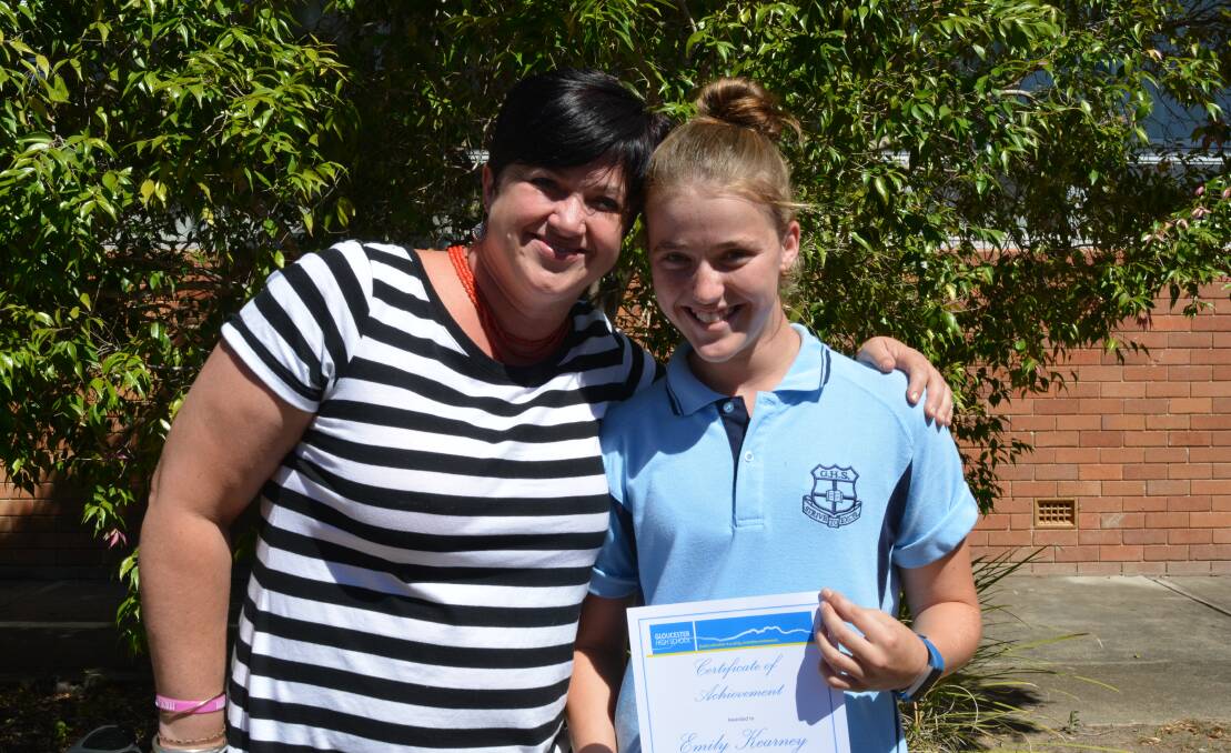Champion effort: Kate Shanley congratulates Emily Kearney on her swimming achievements at the GHS swimming carnival. Photo: Anne Keen