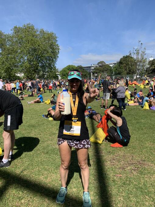 Kaz with her quick recovery bottle of full cream milk after the recent Auckland marathon.