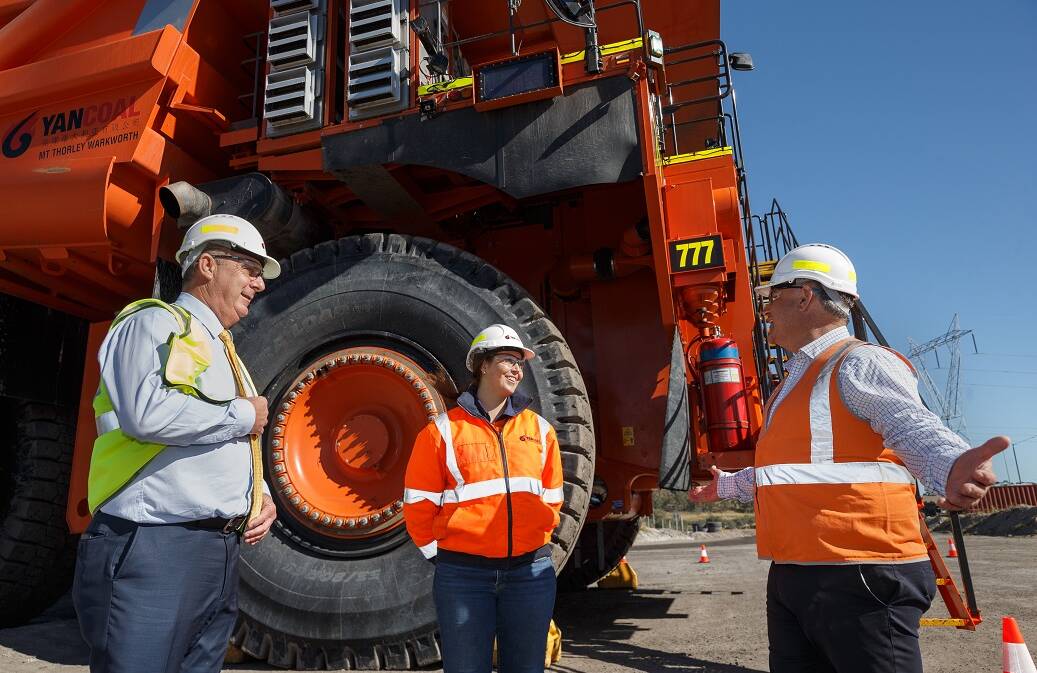 Deputy Premier and Resources Minister John Barilaro, right, with Yancoal mine worker Leah Miller and Upper Hunter MP Michael Johnsen at Mount Thorley/Warkworth open cut mine on Wednesday, June 24.