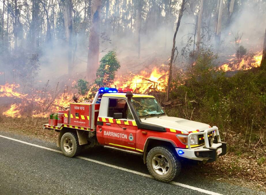 NSW RFS Barrington 9 crew patrolling fire on the Thunderbolts Way on January 5. Photo supplied.