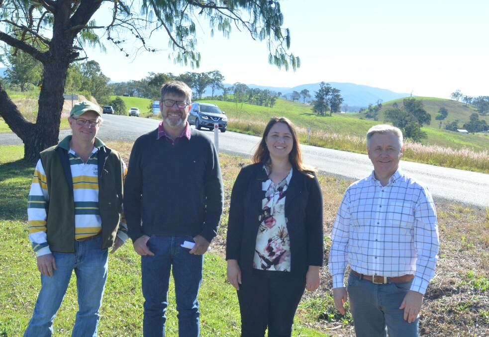 Gloucester region residents Rod Williams, James Hooke and Katheryn Smith meet with Mick Veitch at the Mograni Lookout off the Bucketts Way. Photo Anne Keen