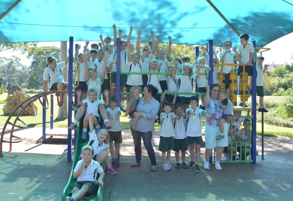Students from St Joseph's Primary School Gloucester, joined by others members of the community celebrate the idea of a new playground. Photo Anne Keen