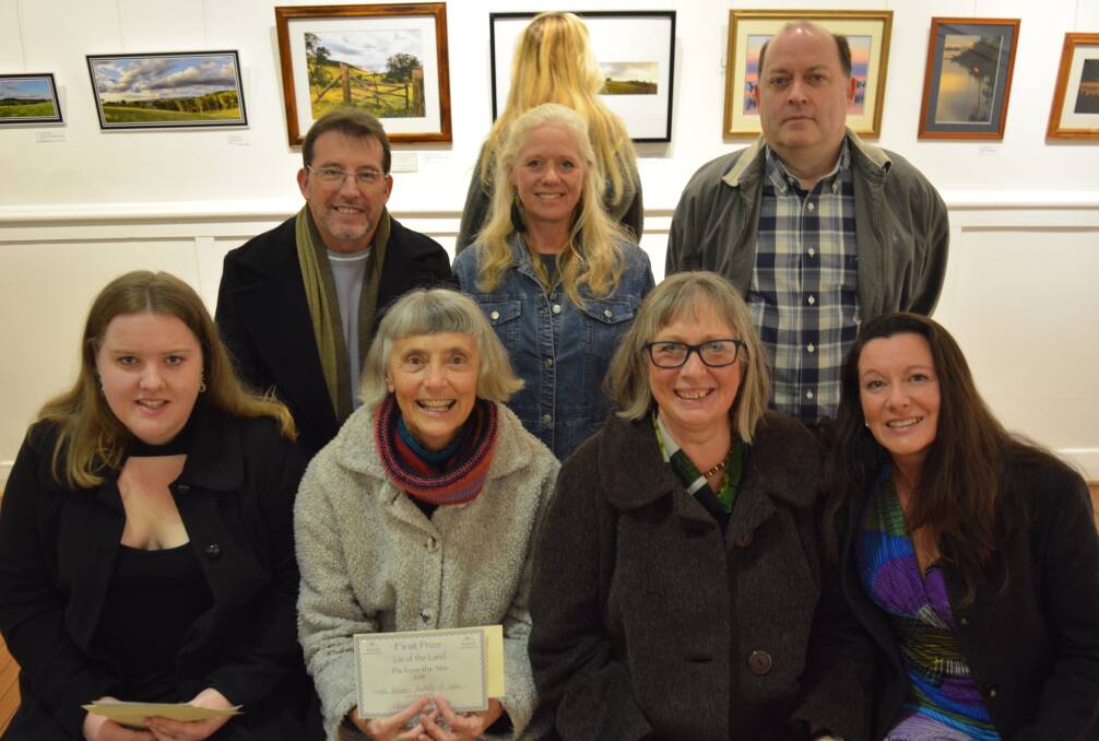 Some of the winners from the Pix from the Stix photography competition with judge Stephen Barry at the official opening of the exhibition. Photo Anne Keen