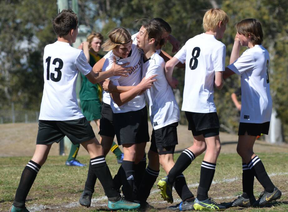 Gloucester Soccer Club's Drifta 16s players celebrate after their recent win. Photo supplied