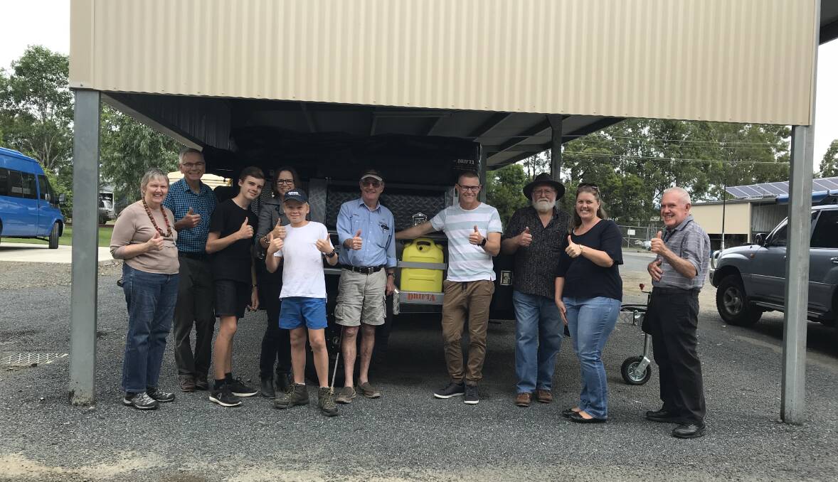 Members of the Mid North Coast regional group of Engineers Australia give a big thumbs up with John Sutton at Drifta Camping and 4WD. Photo supplied