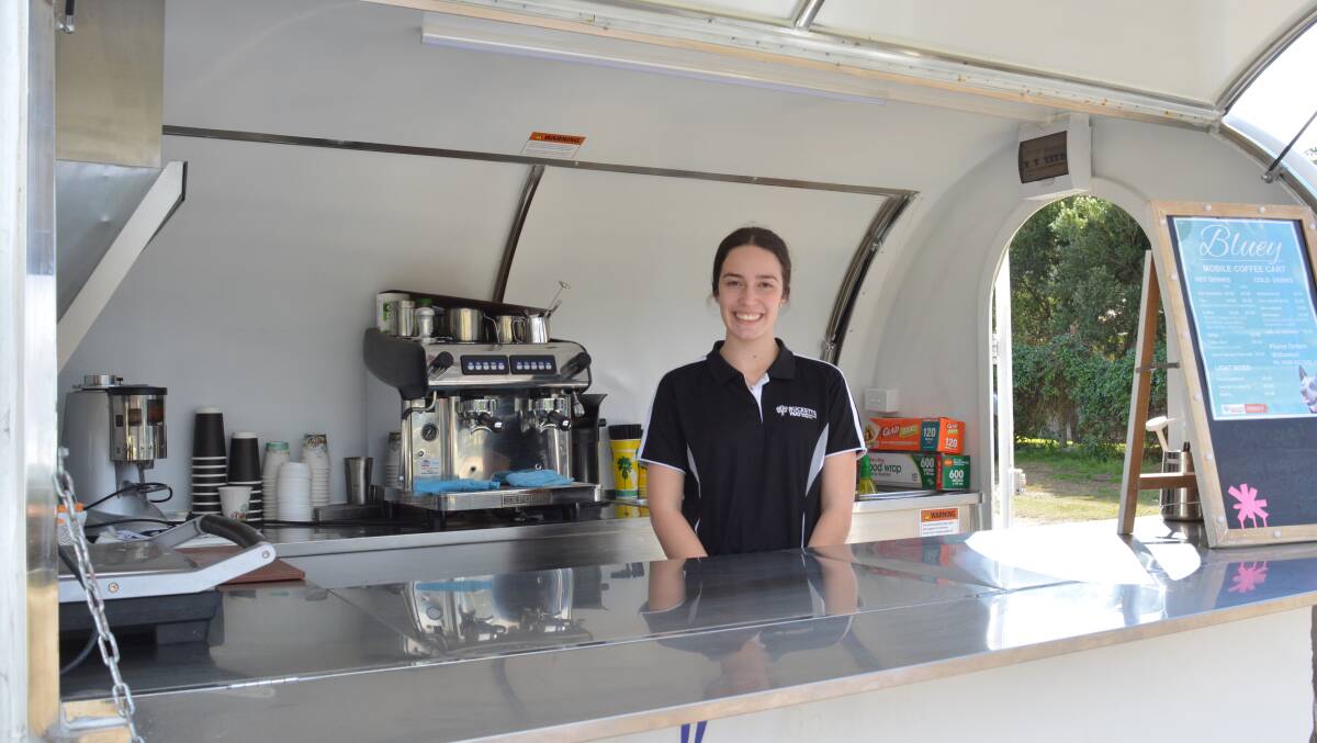 School-based trainee Raquel Burton gets to hang out in Bluey to help with the morning service. Photo Anne Keen 