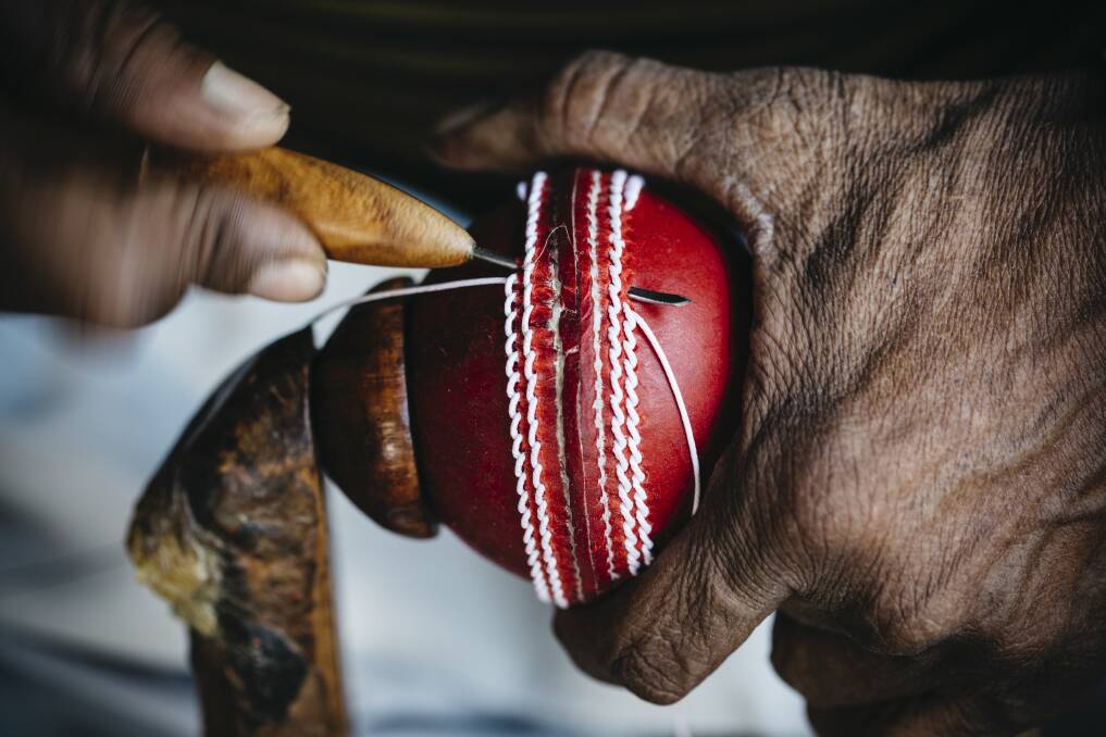 DETAILED: Hand stitching a ball at a cricket factory in Meerut.