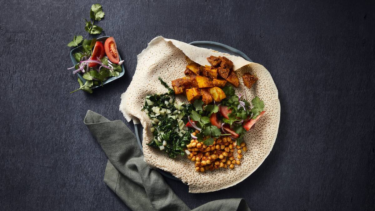 Injera bread, spiced chickpeas and vegetables from East Africa. Picture: Supplied