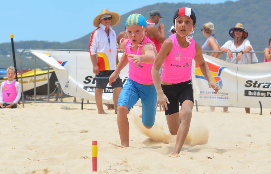 Eyes on the prize: Winner Miller Siaset (Kiama Downs) and runner up Percy Walker (Lennox Head) compete in the final of the under 8s flags. 