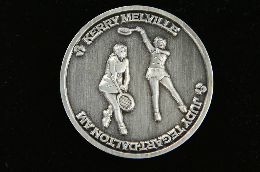 SPARKLING: A commemorative coin, featuring Ballarat's Judy Dalton on the left, to be used in Australian Open matches this year. Picture: courtesy ANZ